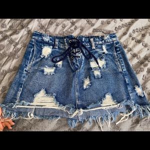 NWOT Distressed lace up denim skirt by Revolve